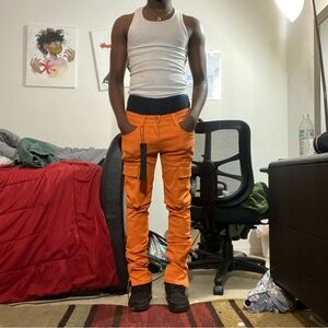 Orange stacked jeans